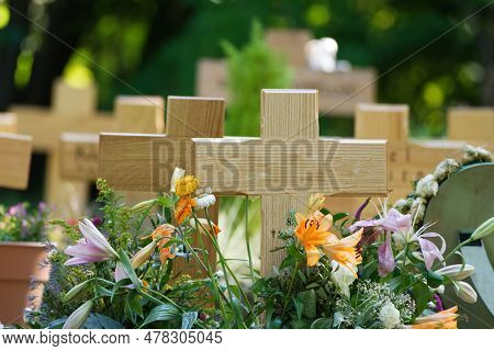 Many Wooden Crosses In A Pauper's Cemetery