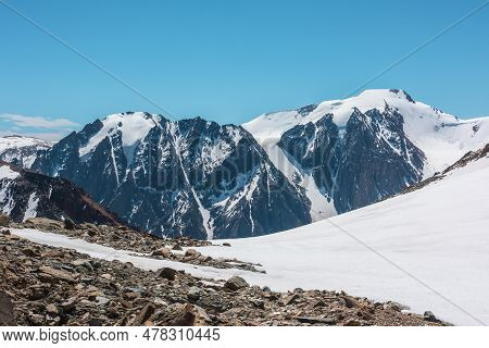 Scenic Landscape With Snowy Mountain Top. Wonderful View From Stonу Snowу Mountain To Mountain Range