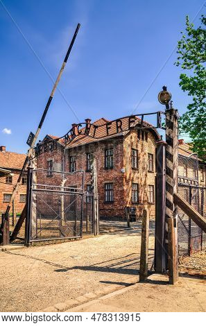Oswiecim, Poland - May 12, 2016: Gate Entrance To Concentration Camp Auschwitz With A Sign Arbeit Ma