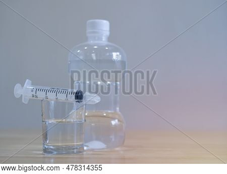 Close Up Of Normal Saline Solution, Nasal Washing Device Set In Allergic Patients Including Salt Wat