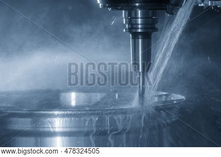 The  Cnc Milling Machine Cutting The Magnesium Alloy Wheel Part With Ball End Mill Tool. The Aluminu