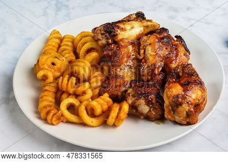 Honey  Barbecue Wings Served With  Season Curly Fries,
