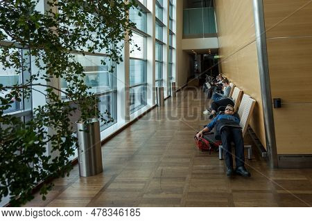 Copenhagen, Denmark - August 24, 2017: Copenhagen International Airport Kastrup. People Sleeping On 