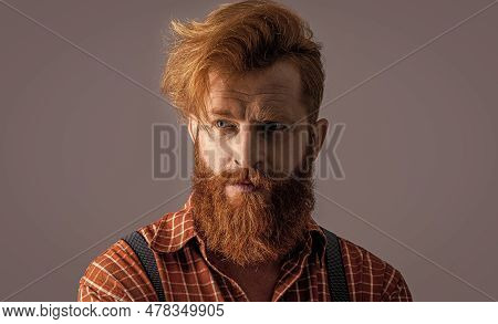 Caucasian Retro Stylish Man In Suspenders Isolated On Grey. Retro Stylish Man In Suspenders