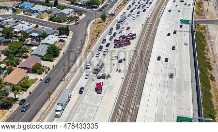 Drone Photo Over A Flipped Car On Highway 4 In Antioch, California With Fire Engines, Police Cars An