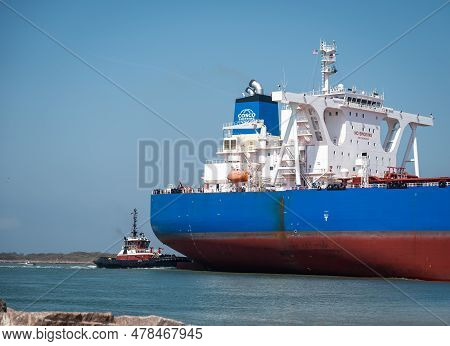 Port Aransas, Tx - 26 Feb 2023: Stern Of Yuan Fu Yang, A Crude Oil Tanker Ship, And Tugboat, Sailing