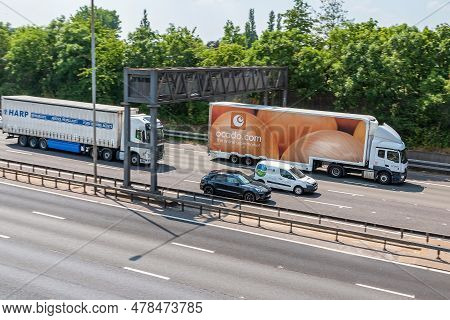 London, Uk - June 14, 2023: Lorry Belonging To The British Online Supermarket Ocado.com, In Motion O
