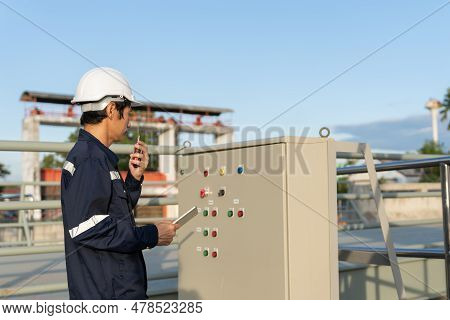Mechanic Or Maintenance Or Electrical Engineer Checking Main Electrical Control Systems Industrial P