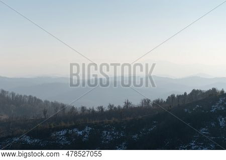 Landscape Of Mountain Layers In Haze, View From Mountain Ljubic Near Prnjavor
