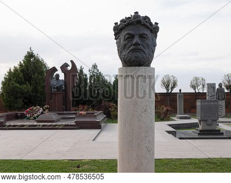 Yerevan, Armenia - 31 March 2023: Sergei Parajanov's Tombstone In The Form Of His Portrait Wearing A