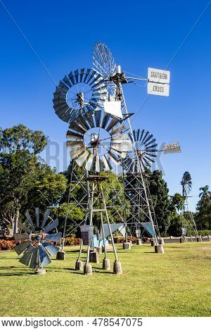 Toowoomba, Australia - May 24, 2023: Collection Of Different Windmills In Front Of The Cobb And Co M