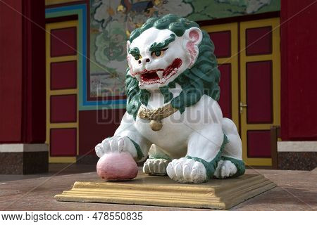 Elista, Russia - June 04, 2023: Sculpture Of A Lion Guarding The Entrance To The Buddhist Temple Of 