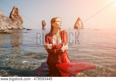 Woman Travel Sea. Happy Tourist In Red Dress Enjoy Taking Picture Outdoors For Memories. Woman Trave