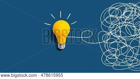 Clarifying Complex Ideas Theme With Light Bulb - Flat Lay
