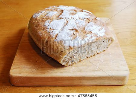 Sourdough On Wooden Chopping Board