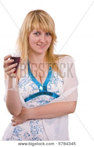 Femme avec un verre de vin.