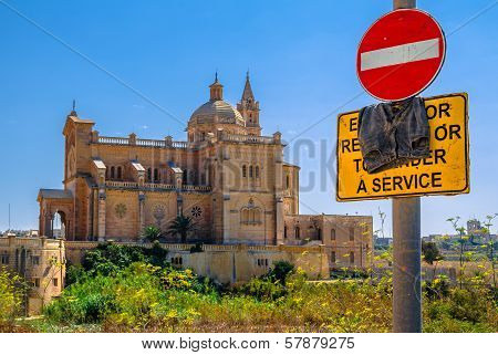 Basilica Of Ta Pinu Behind Sign