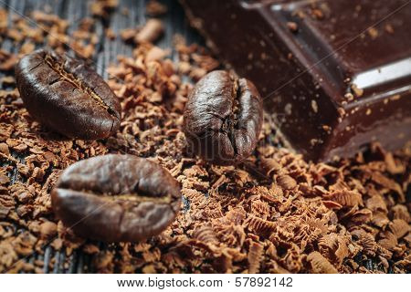 Fresh Roasted Coffee Beans And Stack Of Brown Chocolate