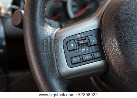 Audio Control Buttons On Steering Wheel Of Car