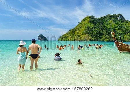 Tourist on the beach of Krabi , Thailand