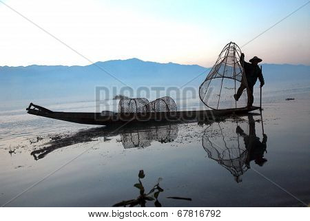 Fisherman Working In Inle Lake.