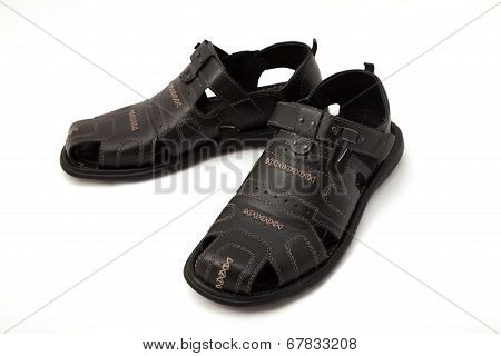 Black sandals on white