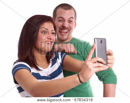 young couple taking selfie