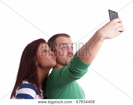 young couple taking selfie