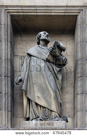 PARIS,FRANCE - NOV 09,2012:Saint Matthew the Evangelist, architectural details of Eglise de la Madeleine. Madeleine Church was designed in its present form as a temple to the glory of Napoleon's army.