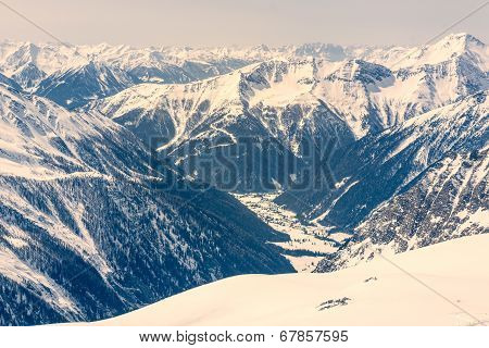 Alpine Valley Surrounded With Mountains