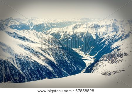 Alpine Valley Surrounded With Mountains