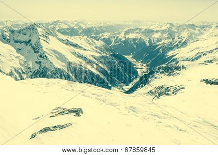 Alpine Valley Surrounded With Mountains