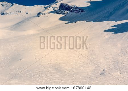 Mountain Slope With Ski Tracks