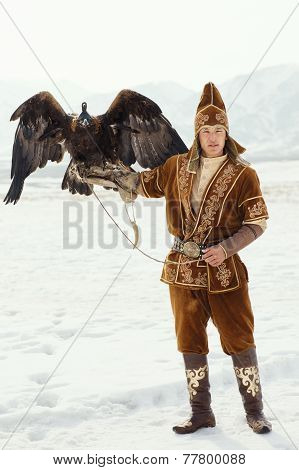 Nura, Kazakhstan - February 23: Eagle On Kid's Hand In Nura Near Almaty On February 23, 2013 In Nura