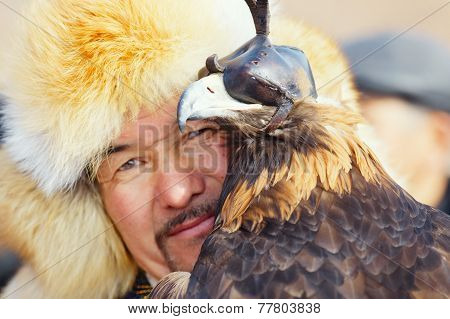 Nura, Kazakhstan - February 23: Eagle On Man's Hand In Nura Near Almaty On February 23, 2013 In Nura