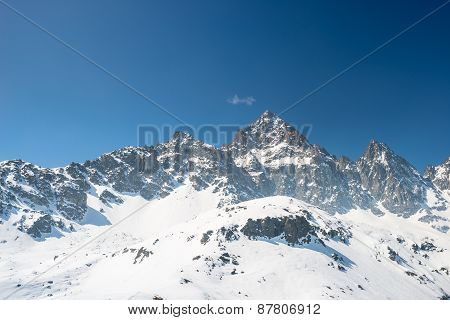 Majestic Mountain Peaks In The Alps