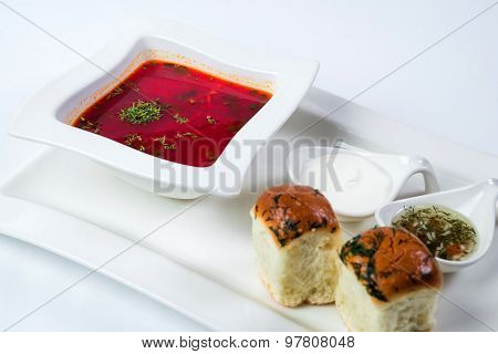 Borsch with creme fraiche, lard and bread