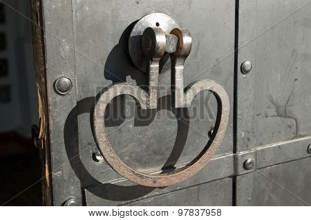 Detail of the door, door handle forged Verkhoturye bell tower of the Kremlin, Russia, Northern Urals