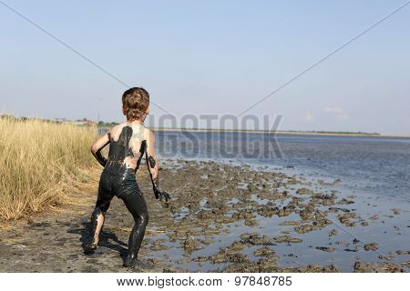 Child Goes On Healing Mud