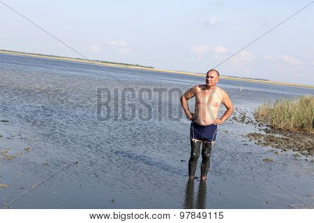 Senior Man Using Healthy Mud