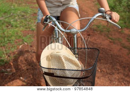 Close-up Of Bicycle Basket With A Hat