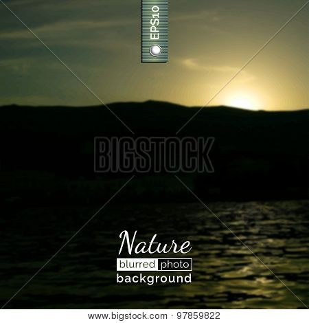 Blurred photo background with sunset.