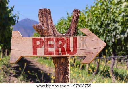 Peru wooden sign with winery background