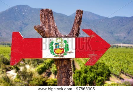 Peru Flag wooden sign with winery background