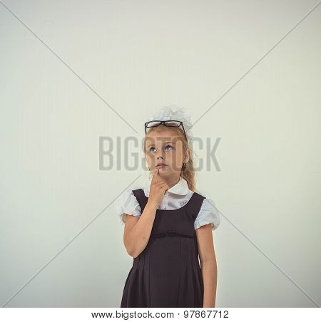 Kid thinking about something, isolated