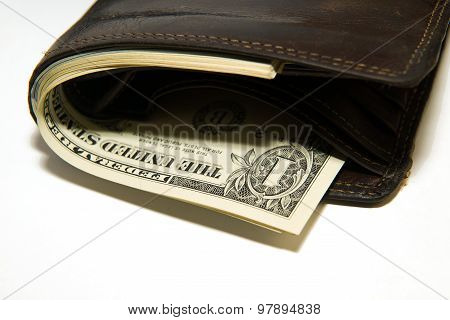Old Wallet With Banknotes Of Us Dollars Inside