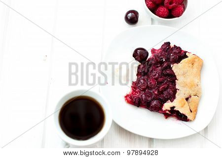 Biscuit With Cherries And A Cup Of Coffee
