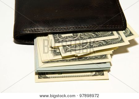 Old Wallet With Banknotes Of Us Dollars Inside