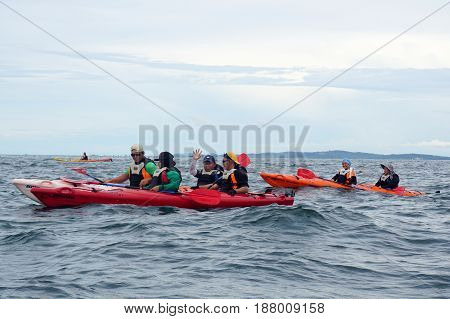 Labuan,Malaysia-Feb 19,2017:Group of adventurer enjoying a weekend kayaking in Labuan island,Malaysia.Malaysia is the ideal place for water sports,like white water rafting,kayaking & scuba diving