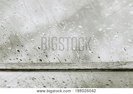 cool rain drops on window in rainyday